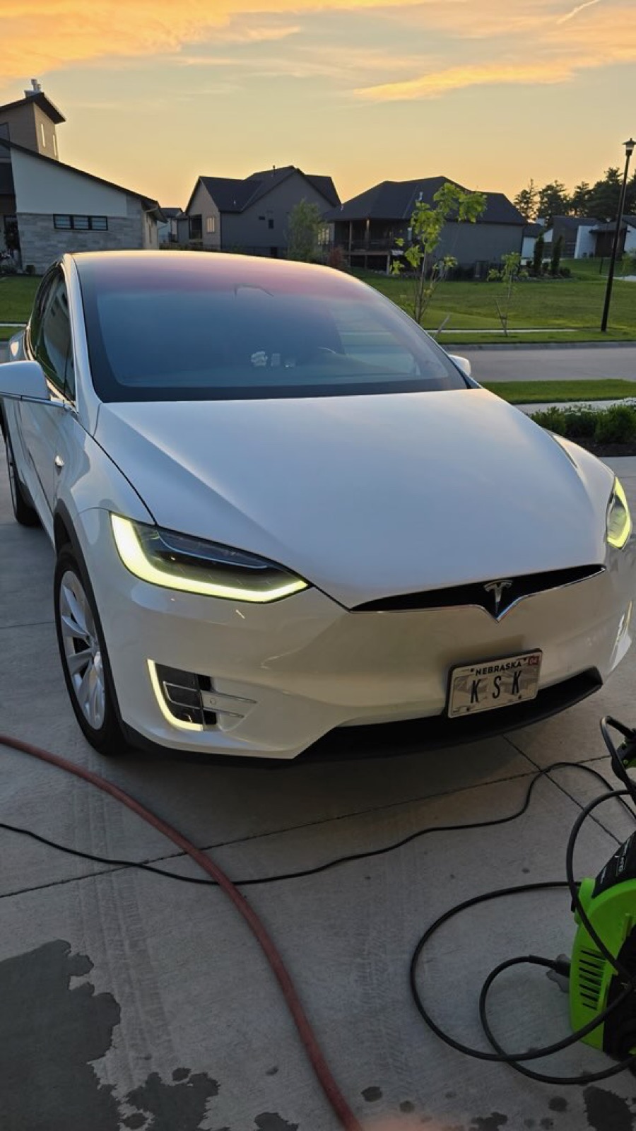 Detailing a Tesla at golden hour