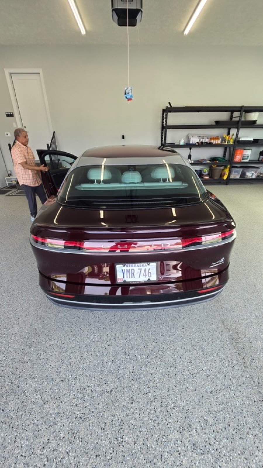 Detailed maroon Tesla